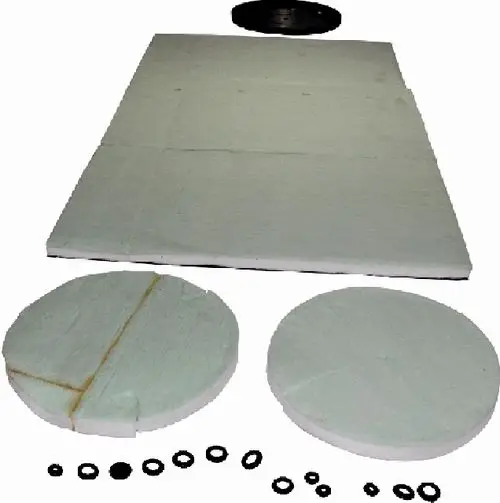 Manteldämmung für Heizungsrohre, bestehend aus mehreren Platten und Ringen. Geeignet für den Einsatz in Heizsystemen. Hersteller ist Wolf.